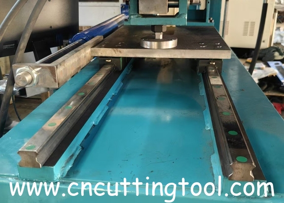 Circular saw blade tension and rolling machine hydraulic model
