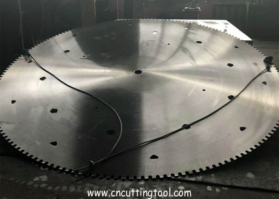 Induction welding tempering quarry saw blanks for gantry cutting machine
