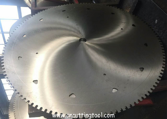 Induction welding tempering quarry saw blanks for gantry cutting machine