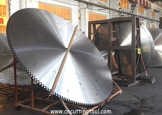 Induction welding tempering quarry saw blanks for gantry cutting machine